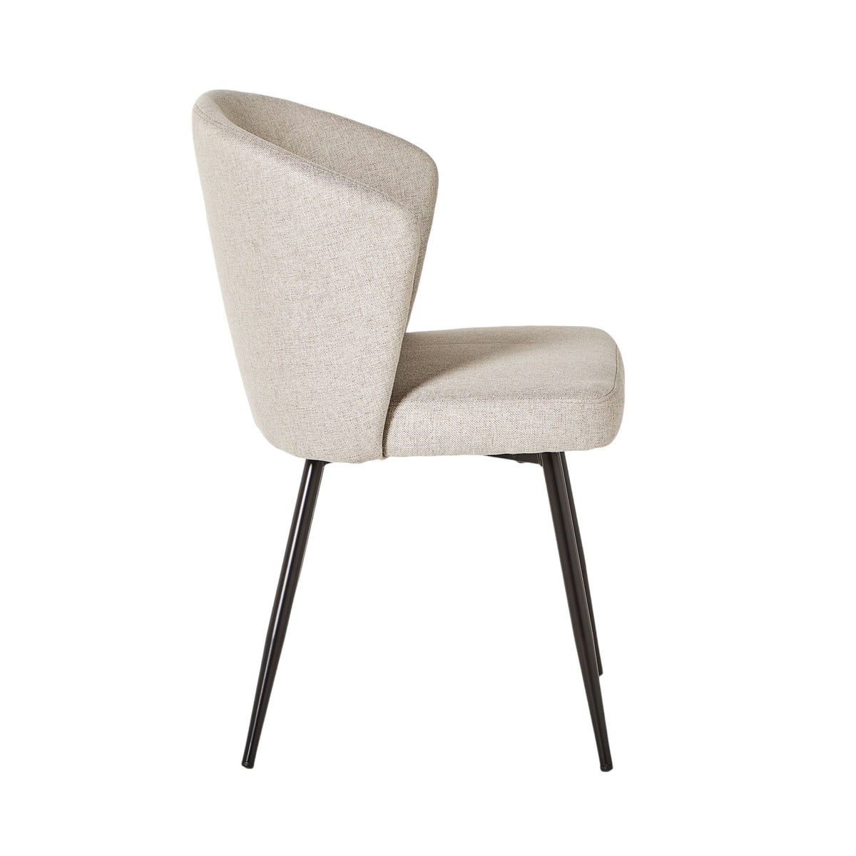A side view of the Cole Dining Chair Clay, with a curved backrest and black metal legs—ideal for modern, mod living style interiors.