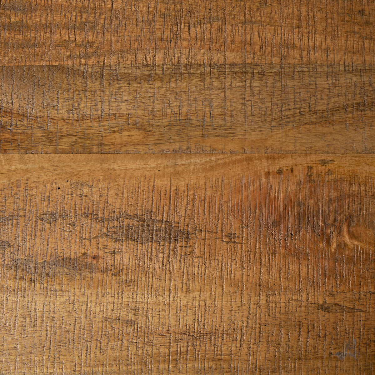 Close-up of the Fulham Side/Bedside Table reveals a wooden surface with visible grain patterns and varying shades of brown, highlighting the rich texture of mango wood.